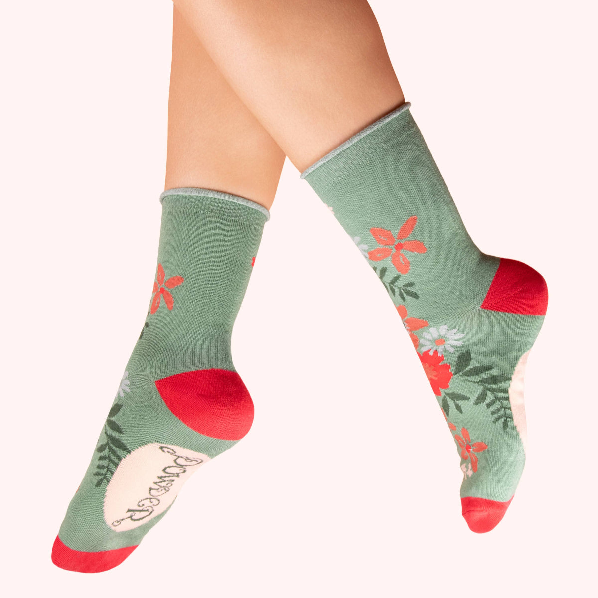 Grüne Knöchelsocken mit roten Blumenmuster