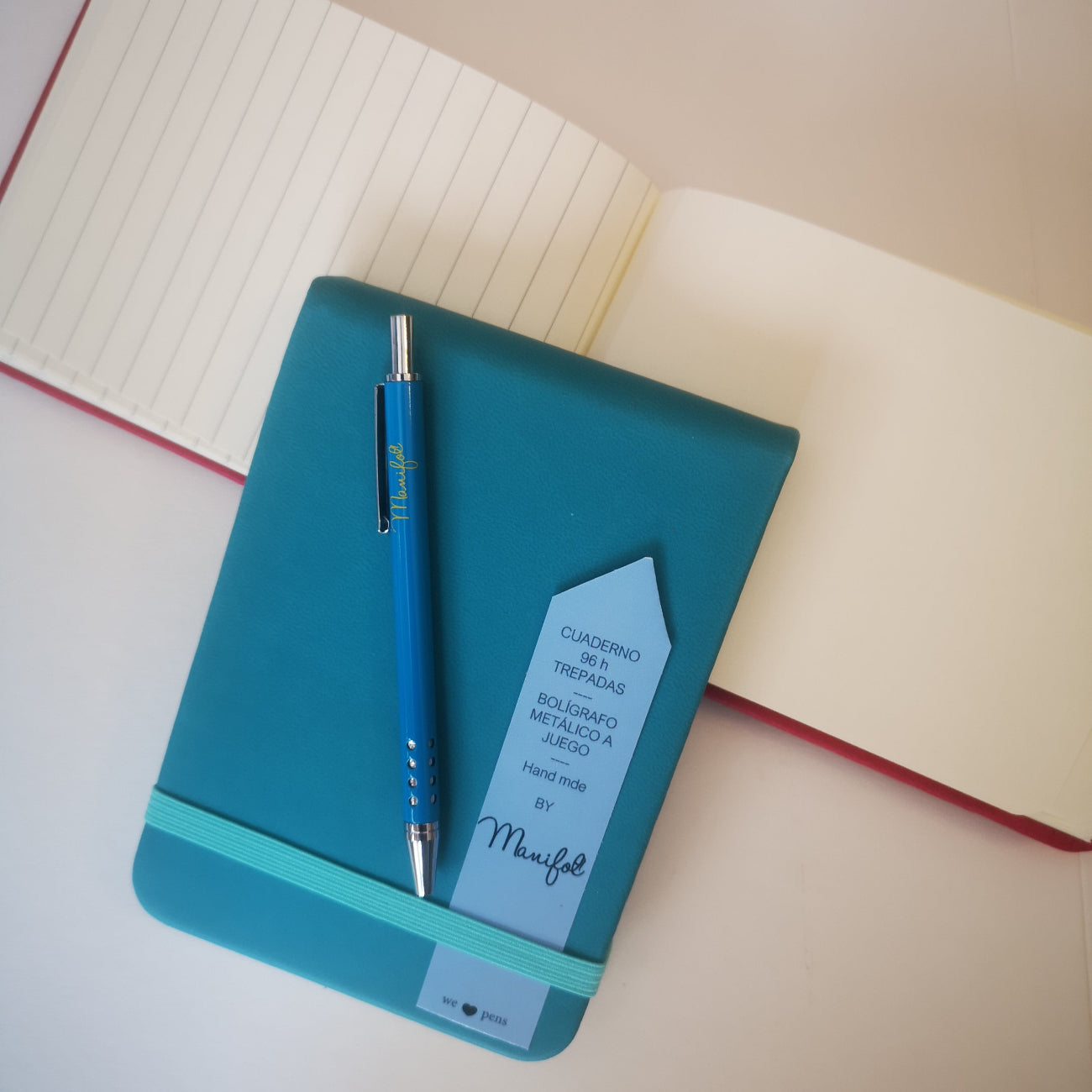 Vertikales Notizbuch in A6 mit Stift in türkis