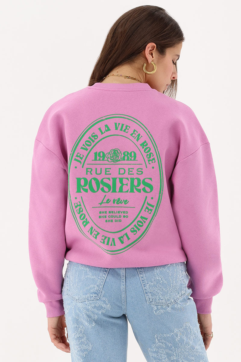 Rosa Damen Sweater mit grünen Aufdruck